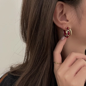 Vintage gold-tone C-shape hoop earrings wrapped in deep red velvet fabric for women