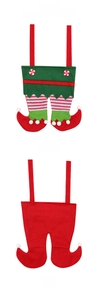 Detail view of Christmas elf leg gift bag with red and green stripes and soft felt texture