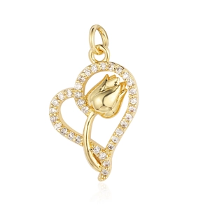 Macro shot of gold-plated heart pendant with tulip design and zircon inlay details