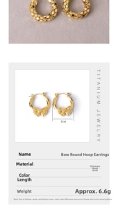 Detail view of gold bow knot hoop earrings in titanium steel with 2cm diameter measurement