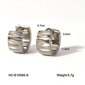 Macro view of silver stainless steel hoop earrings with precise size dimensions and weight