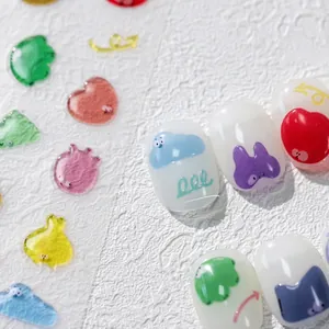 Detailed macro view of 3D jelly nail stickers with colorful cute cartoon illustrations
