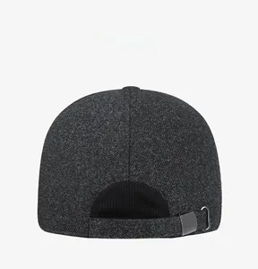 Detail of winter men's cap with wool blend texture and adjustable metal back buckle