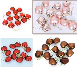 Macro shot of 5cm electroplated heart-shaped Christmas ornaments in matte and gloss finishes