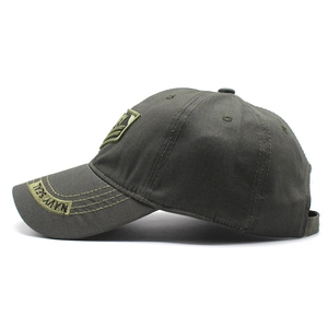 Detail view of olive green tactical baseball cap with NAVY SEAL embroidery