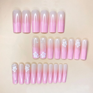 Pink gradient long coffin press-on nails with white flowers and pearl 3D decorations