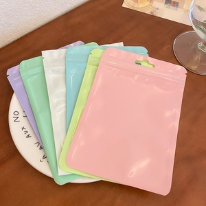 Set of colorful macaron plastic zip-lock bags with resealable closure and hanging hole