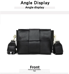 Close-up of woven leather texture and gold hardware on black crossbody bag