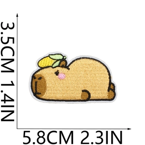 Detail showing Capybara embroidered patch dimensions 3.5cm x 5.8cm on white background