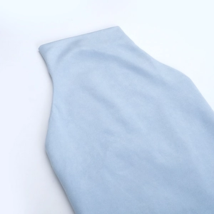 Close-up of light blue cowl neck top showing soft brushed matte fabric texture