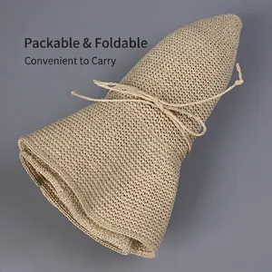 Foldable straw sun hat for women in beige with a portable roll-up design for travel