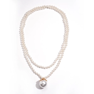 Elegant multi-layer baroque pearl necklace with a large round pearl pendant and gold accents
