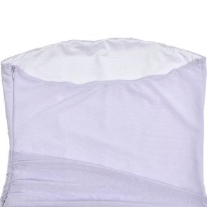 Detail view of purple strapless dress featuring mesh fabric ruffles and hidden zipper