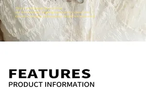 Detailed view of intricate cream lace fabric featuring vintage floral embroidery textures