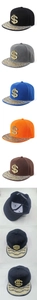 Detail view of five hip hop snapback caps with rhinestone dollar signs and glitter brims