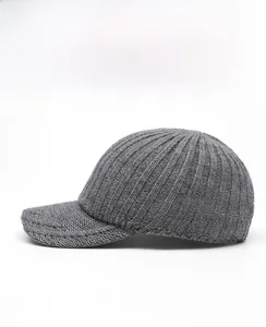 Side view of gray ribbed knit baseball cap showing thick texture for winter warmth
