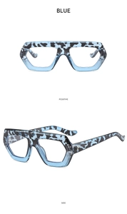 Macro detail of blue tortoise shell glasses frame with trapezoid geometric design