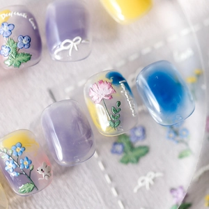 Floral adhesive nail art stickers in soft pastel colors with frosted thin transparent finish