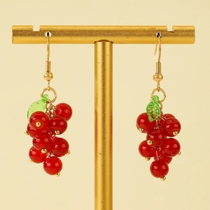 Retro grape drop earrings with red translucent beads and green leaves on gold hooks