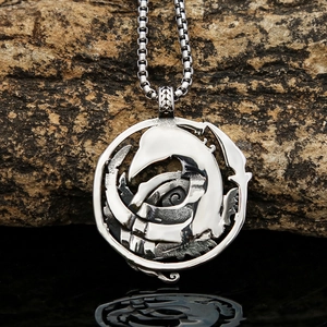 Retro stainless steel viking necklace featuring a round dragon pendant on a textured rock