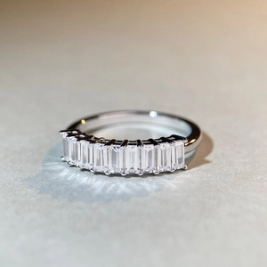S925 sterling silver eternity band with rectangular cubic zirconia stones in minimalist style