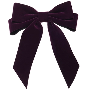 Elegant purple velvet bow hair clip with long ribbons on a clean white background
