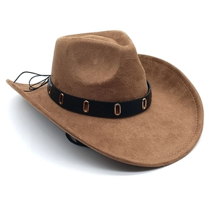 Detail of brown faux suede cowboy hat with black leather band and gold metal rings