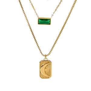 Double-layer gold stainless steel necklace with sun moon pendant and green zircon stone