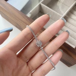 Detailed close-up of a silver S925 sterling silver tennis bracelet with cubic zirconia