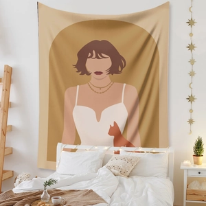 Detail view of Bohemian wall tapestry featuring a woman and cat in warm earth tones