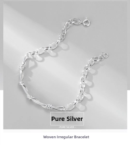 Detailed macro view of solid sterling silver twisted wire weaving and buckle link bracelet