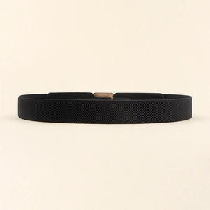 Detail of black elastic waist belt with woven texture and a sleek metal buckle design