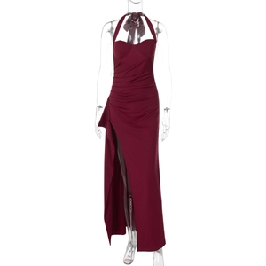 Detail of burgundy halter neckline with elegant pleated textures on evening maxi dress