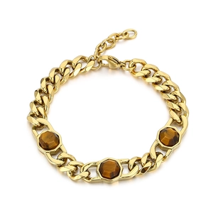 Gold stainless steel cuban chain bracelet featuring three hexagonal tiger eye stones