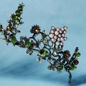 Baroque bridal crown with green crystals and pink pearls on a vintage bronze metal frame