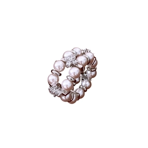 Double-layer pearl elastic ring featuring silver star zircon ornament on white background