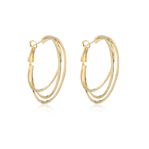 Detailed close-up of 18K gold plated triple hoop earrings with a frosted texture