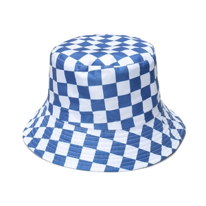 Close-up of blue and white checkered pattern on a canvas sun protection bucket hat
