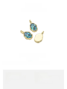 Detailed view of irregular 18K gold plated copper pendant with opal inlay for DIY jewelry