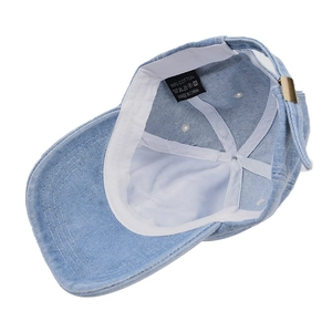 Distressed light blue cotton denim baseball cap with adjustable metal strap and vintage wash