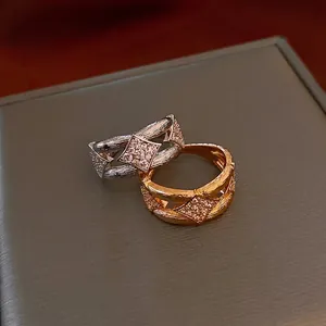Vintage style wide rhodium and gold band rings set with zircon and brushed metal finish