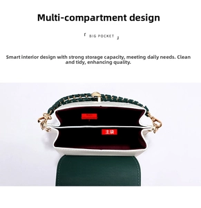 Detailed view of dual main compartments with dark red lining in green crossbody bag