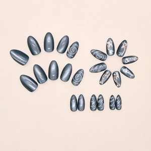 Detailed macro view of 3D spiral relief and shimmering koi fish patterns on cat eye nails