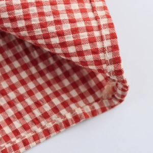 Sleeveless red and white checkered plaid dress in sweet preppy style with waist detail