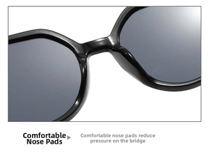 Macro detail of comfortable nose pads on black thick frame sunglasses for reduced pressure