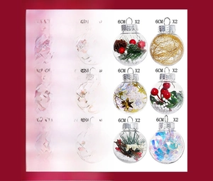 Detail showing 12pcs of 6cm PET transparent Christmas baubles with varied festive fillings