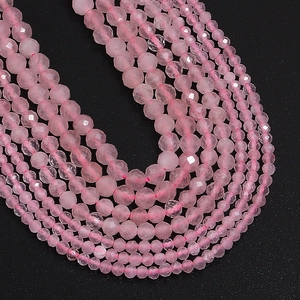 Macro detail of faceted pink quartz stone beads for DIY jewelry making and crafts