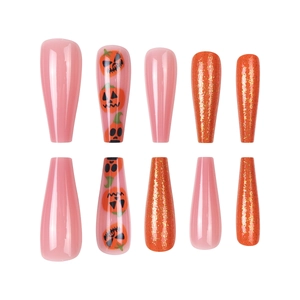 Halloween pumpkin press-on nails with long coffin shape and orange glitter finish