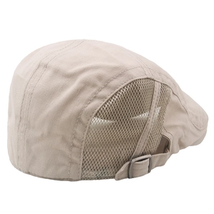 Detail view of beige mesh newsboy cap showing breathable fabric and metal buckle