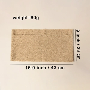 Macro detail of camel teddy fleece baby organizer showing 16.9x9 inch size and 60g weight